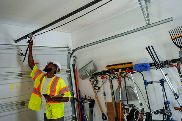 Professional Garage Door Panel Replacement technician working in Garrett, IN